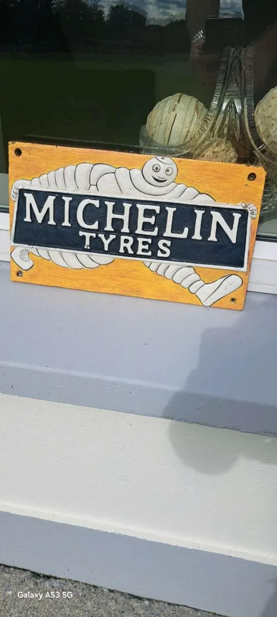 Mitchelan  cast iron sign