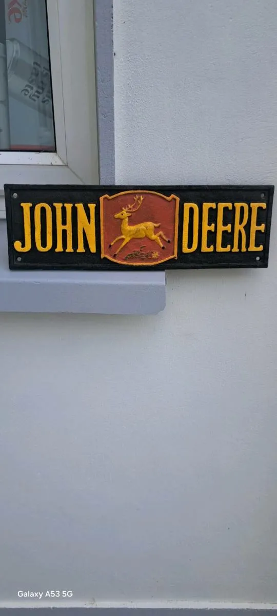 Large  john deer cast iron sign