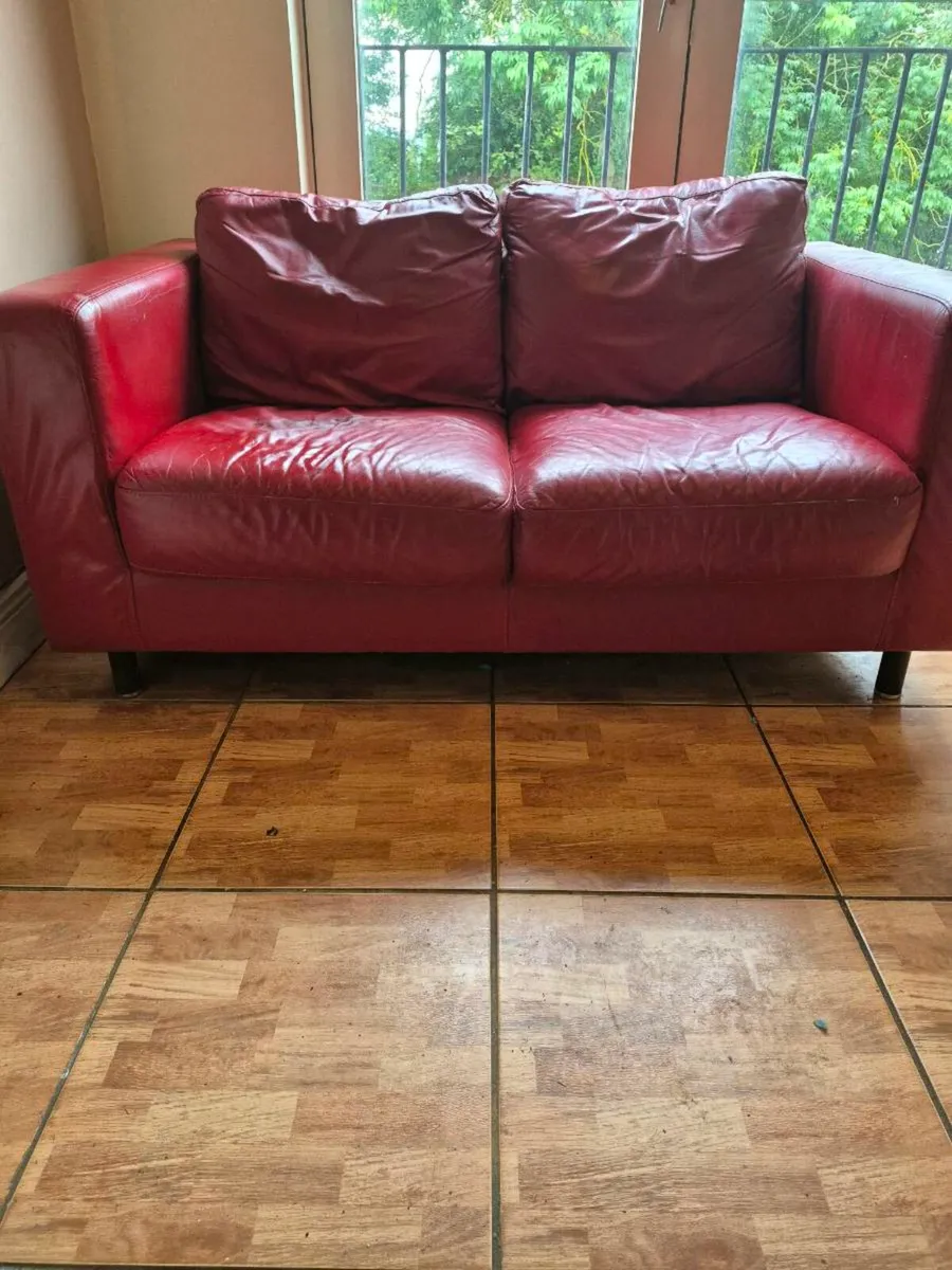 Red leather two seater sofa - Image 1
