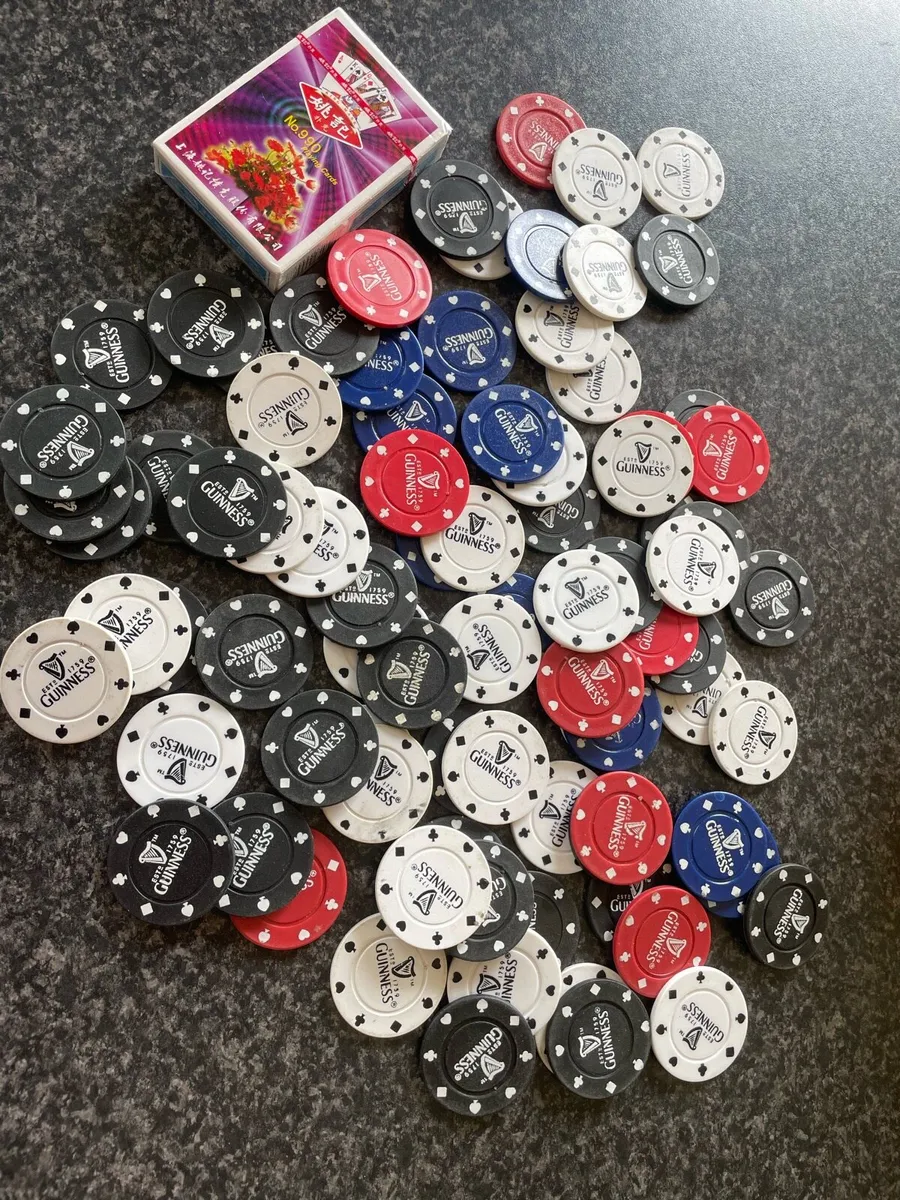 87 Guinness-branded poker chips and Guinness cup - Image 1