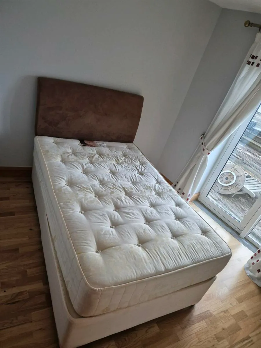 Small double divan bed with velvet headboard
