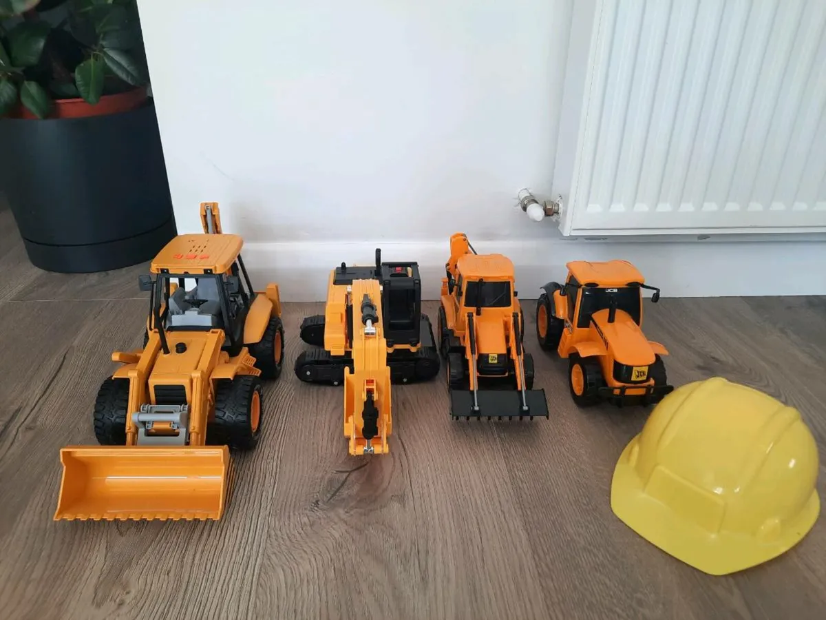 JCB and CAT Toy Diggers and Trucks - Image 1