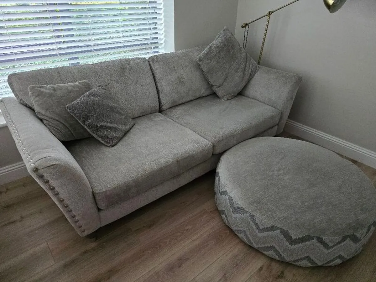 DFS Lawrie Formal Back 4 seater Sofa with  a large round pattern and plan footstool, - Image 1