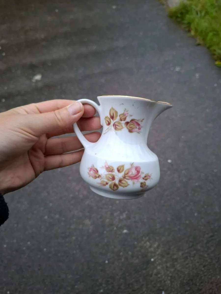 Rose porcelain milk jug postage possible