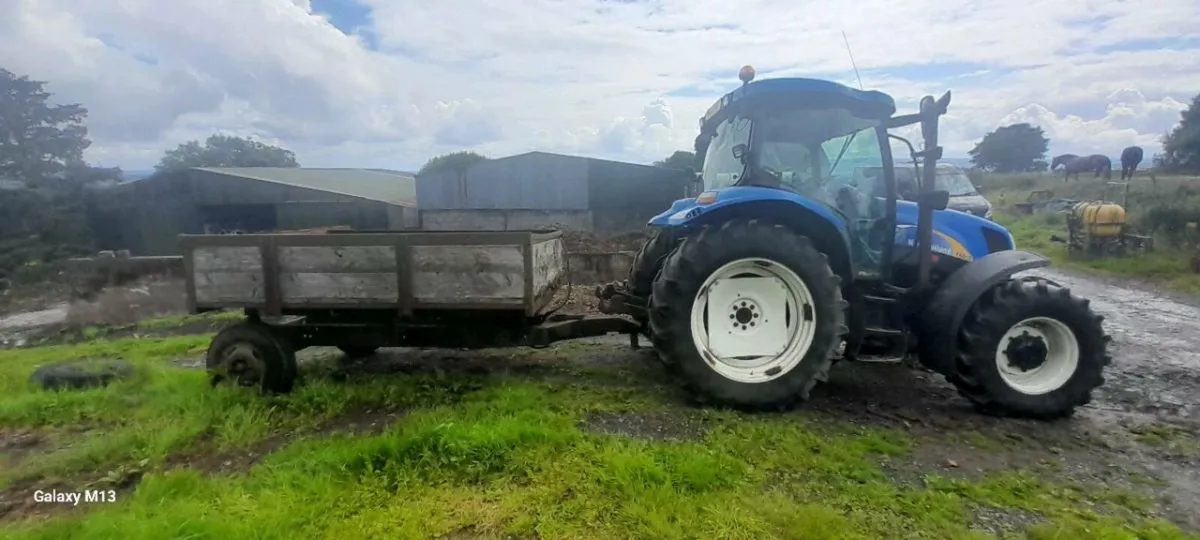Tractor tipping trailer - Image 1