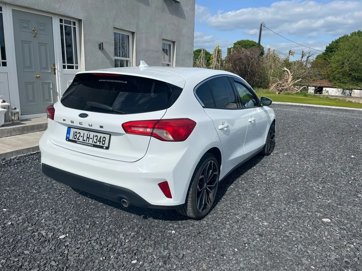 White Ford Focus - Image 2