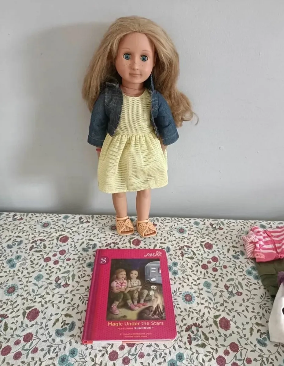 Our Generation doll and book