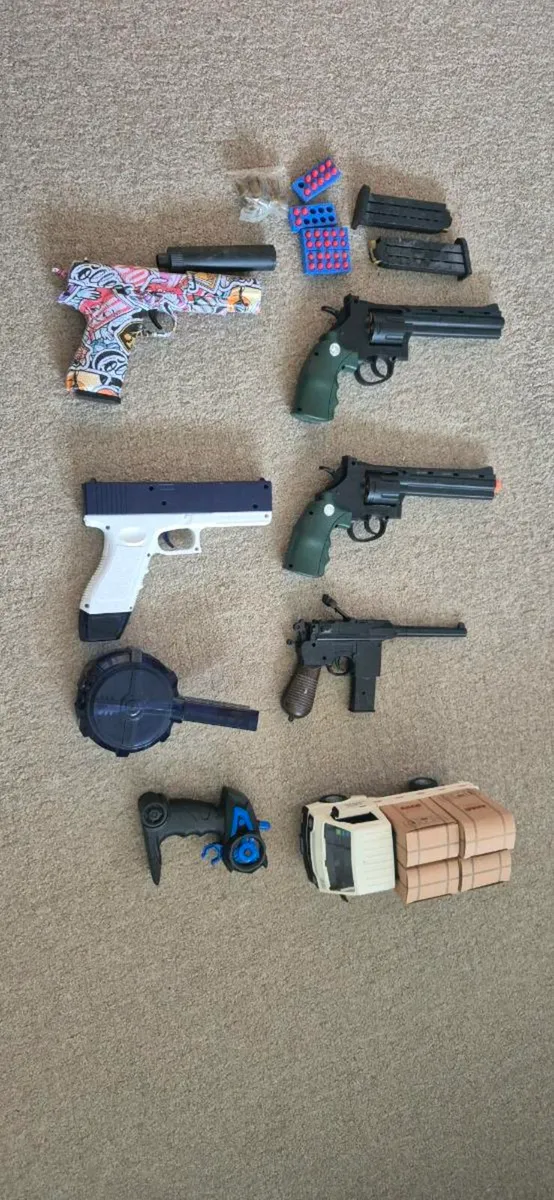 Toys guns and RC truck - Image 1