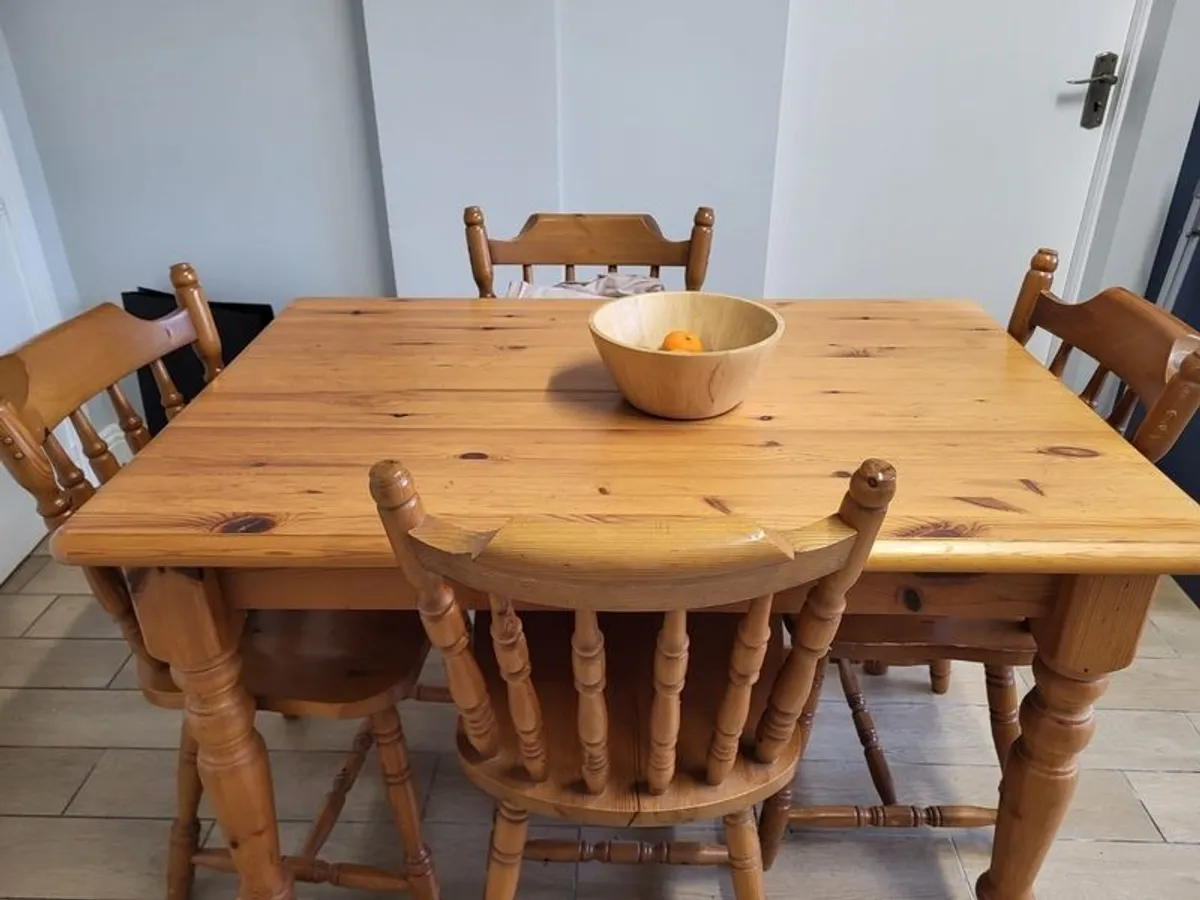 Wooden kitchen table and four chairs - Image 1