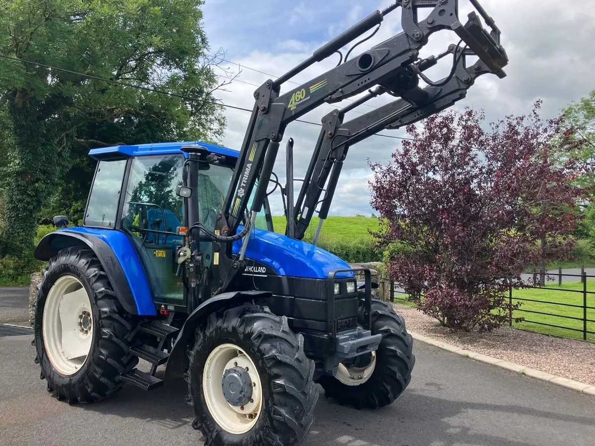 NEW HOLLAND 4 WD with LOADER - Image 1
