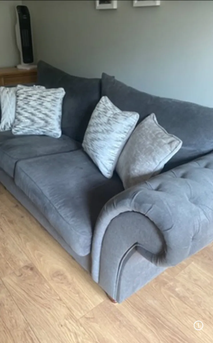 Three seater button hole sofa for sale.