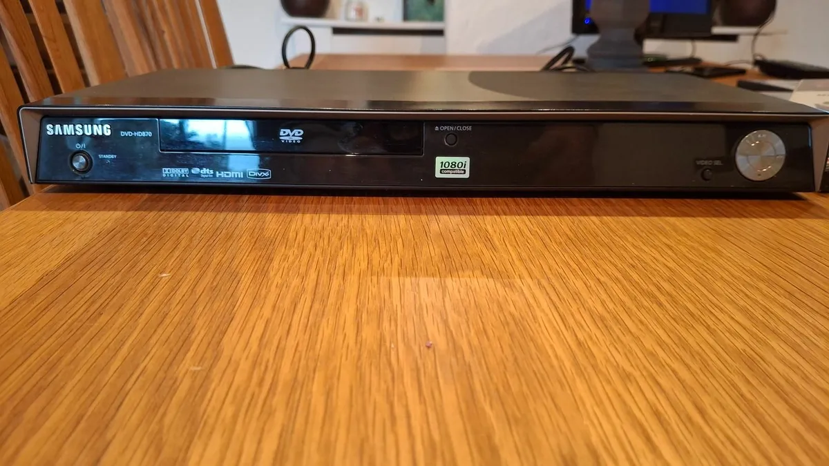 Samsung DVD Player with remote control & 31 DVD's - Image 1