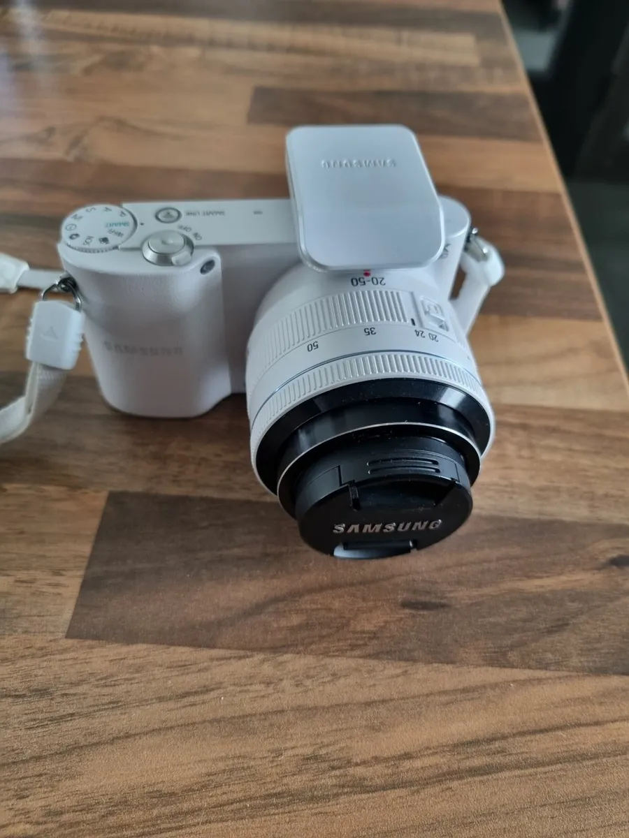 Samsung NX1100 camera with telephoto lens and acce - Image 1