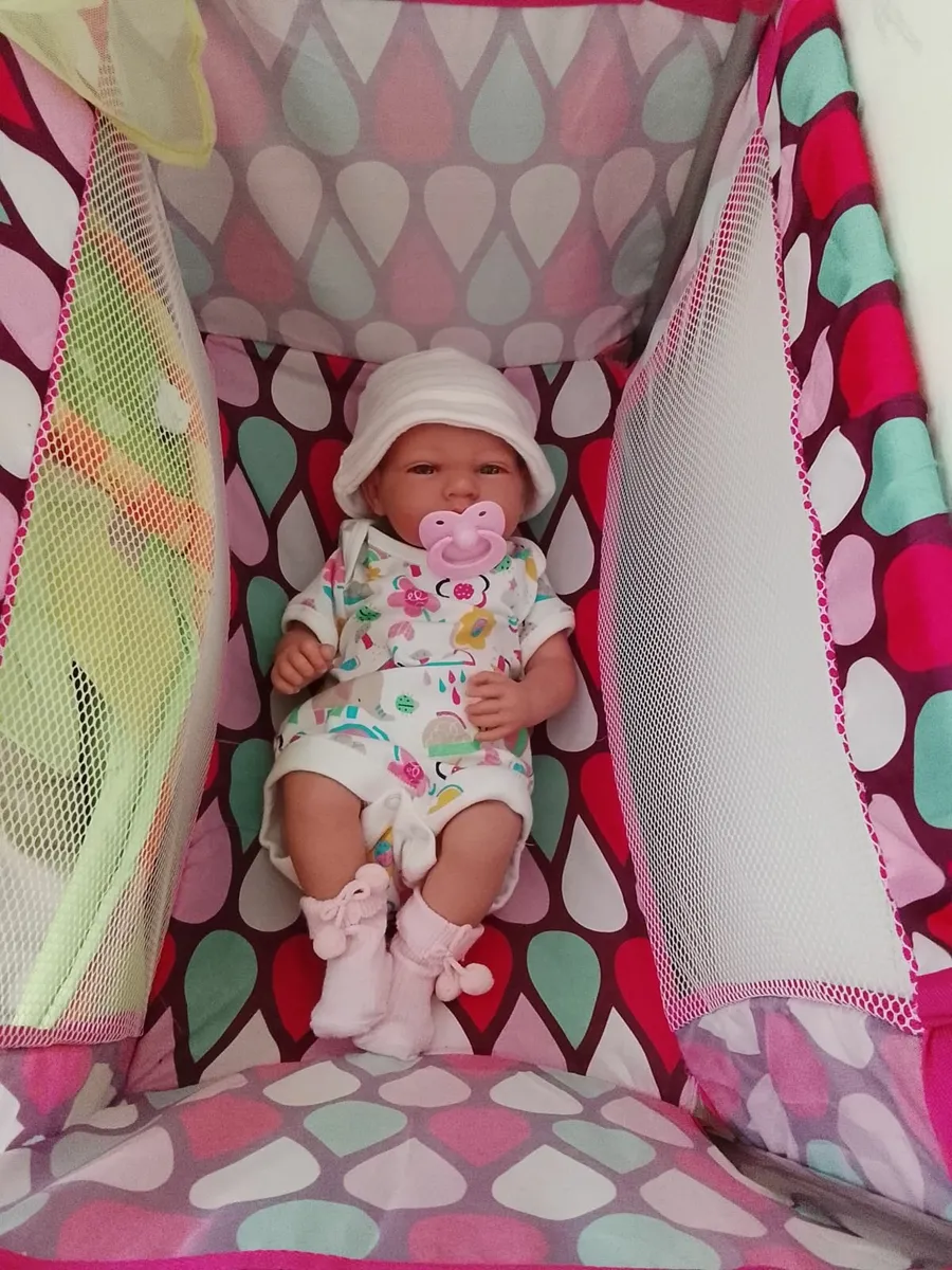 Baby doll and cot