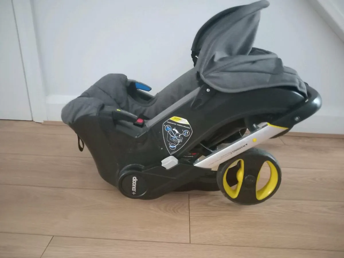 Doona car seat buggy with rain cover - Image 2