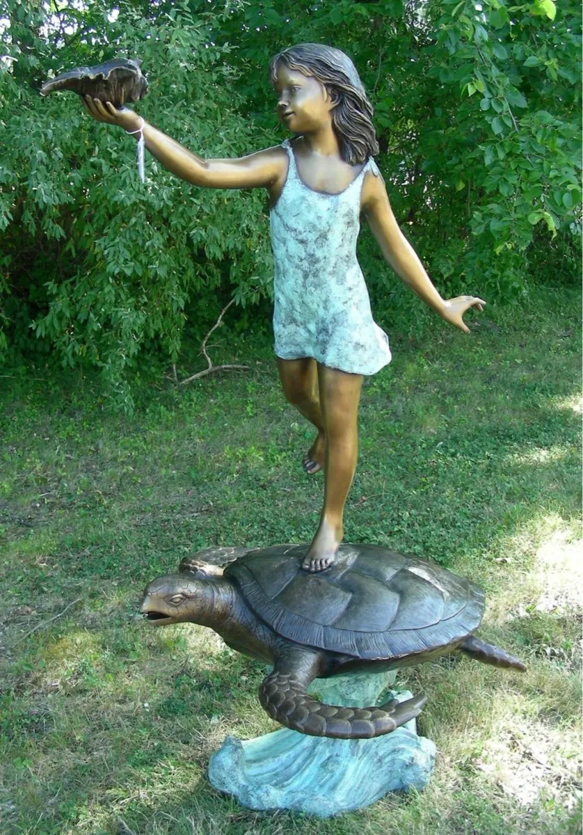 Bronze girl with turtle water feature