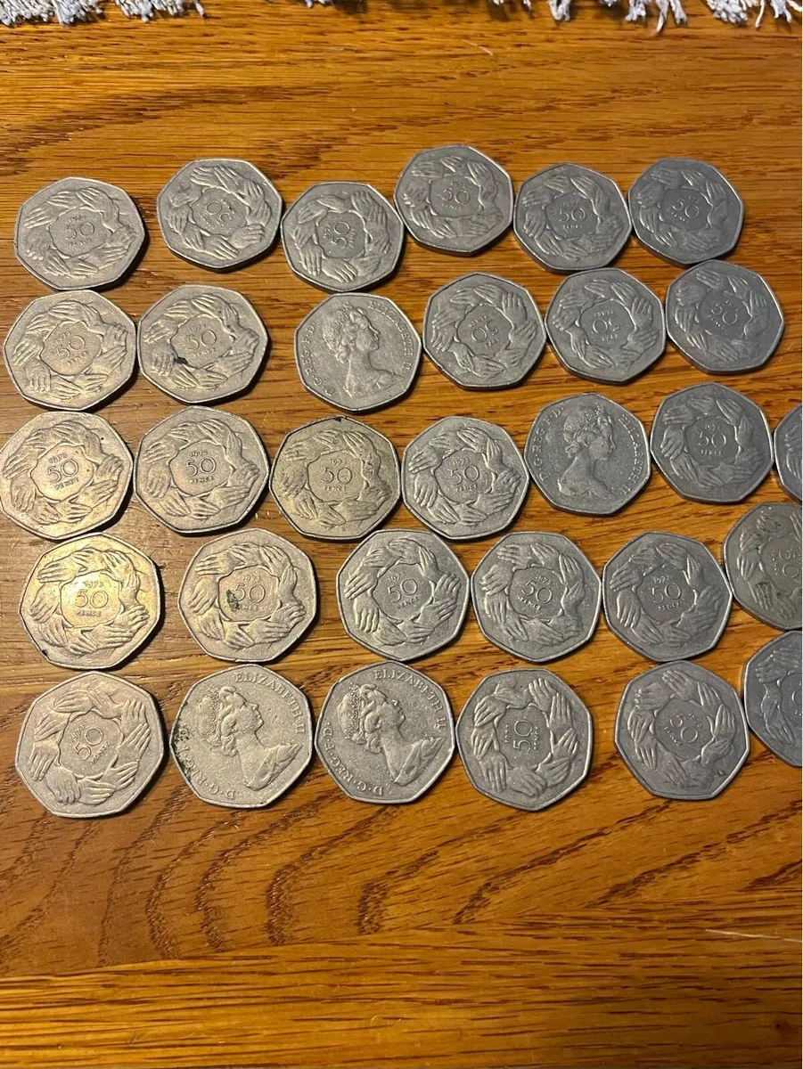 31 X 50 pence 1973 hands & Queens head