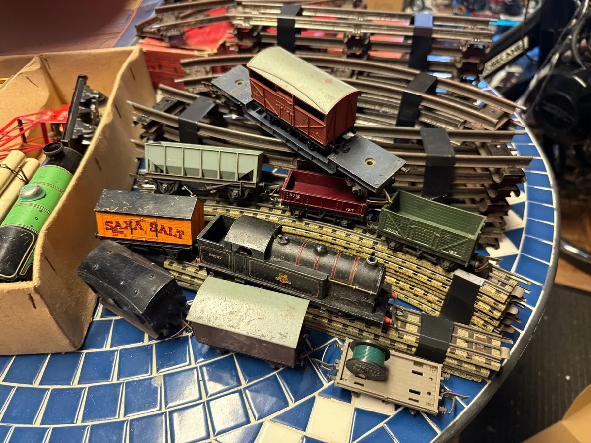 A collection of model trains and track - Image 2