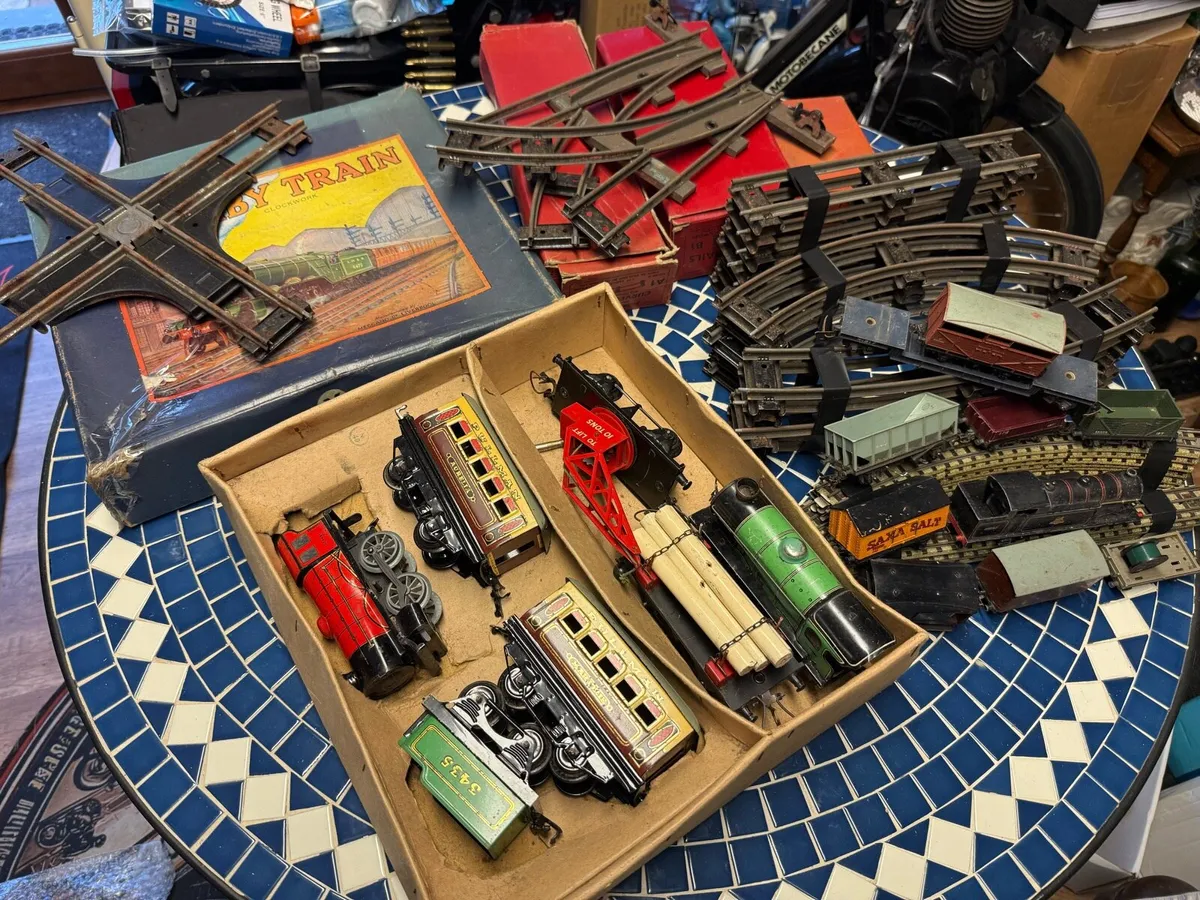 A collection of model trains and track - Image 3
