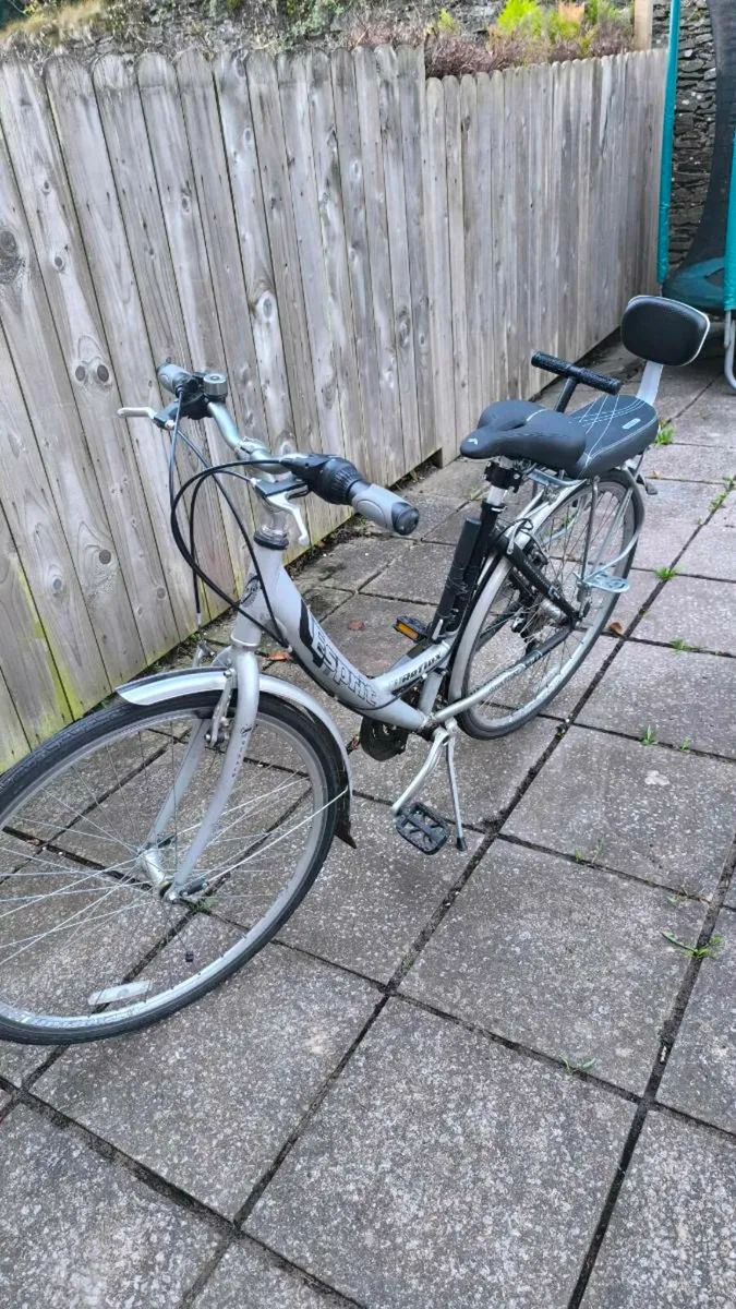 Bicycle with child seat - Image 1