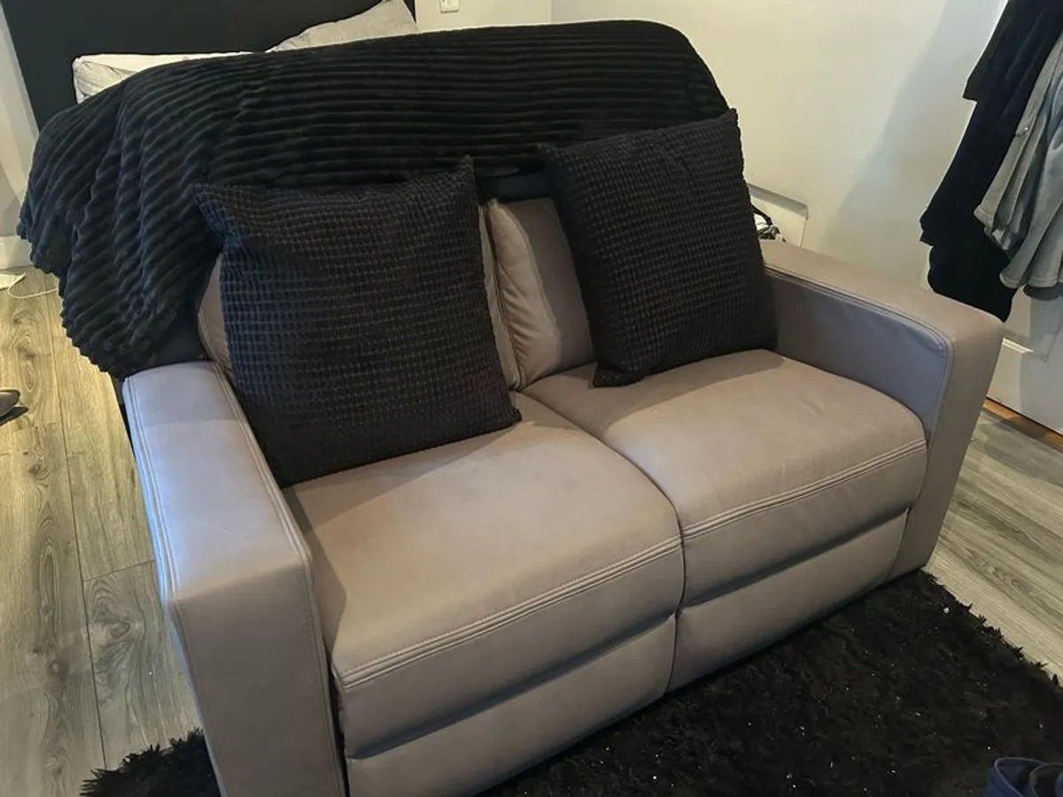 2 seater sofa with cushions and blanket - Image 1