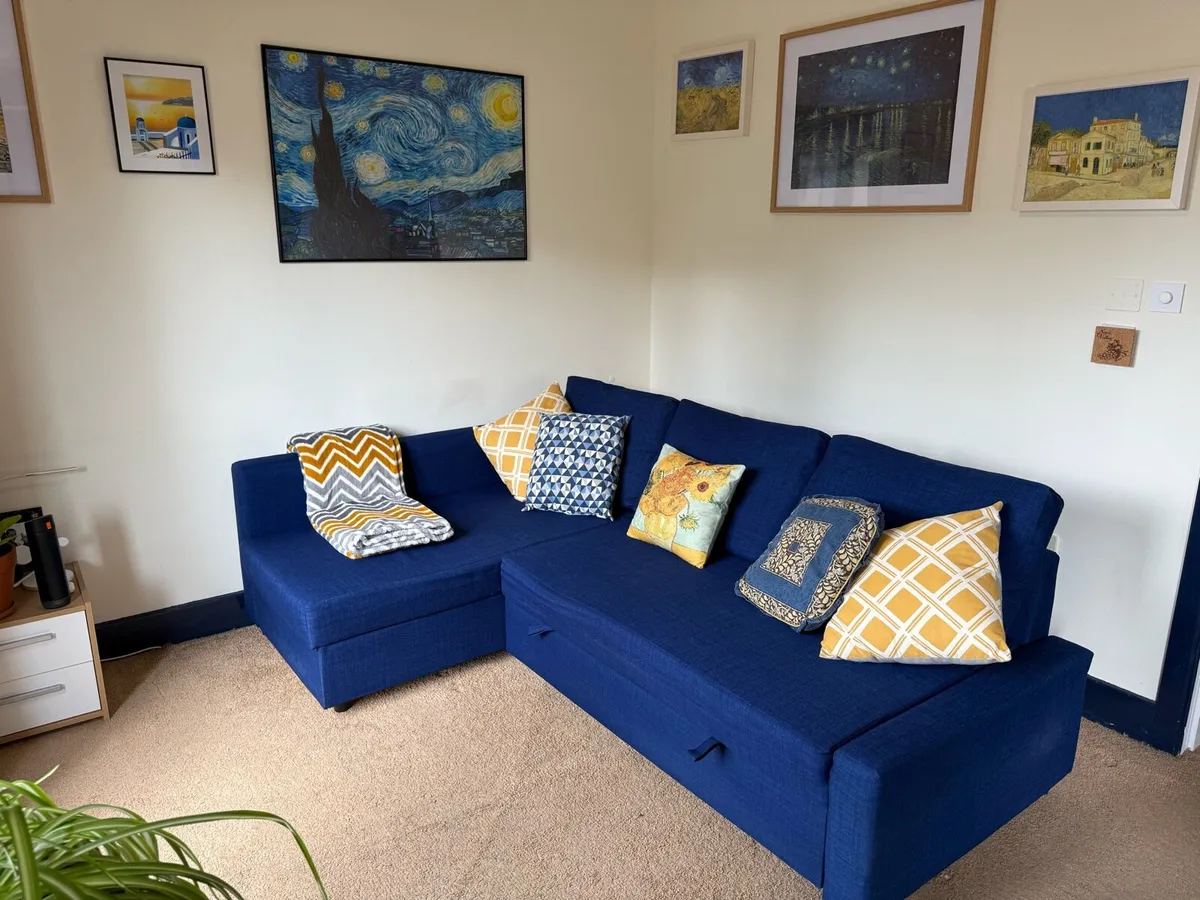 Corner sofa-bed with storage - Image 1