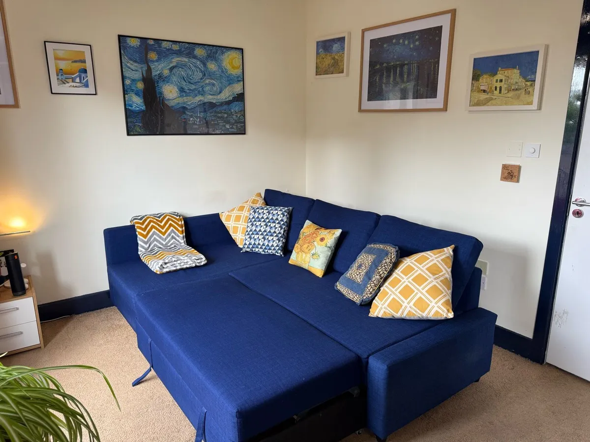 Corner sofa-bed with storage - Image 3