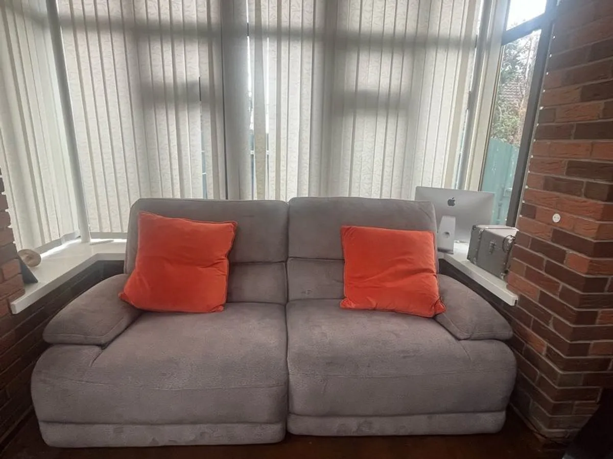 Grey Electric reclining couch with USB ports - Image 1
