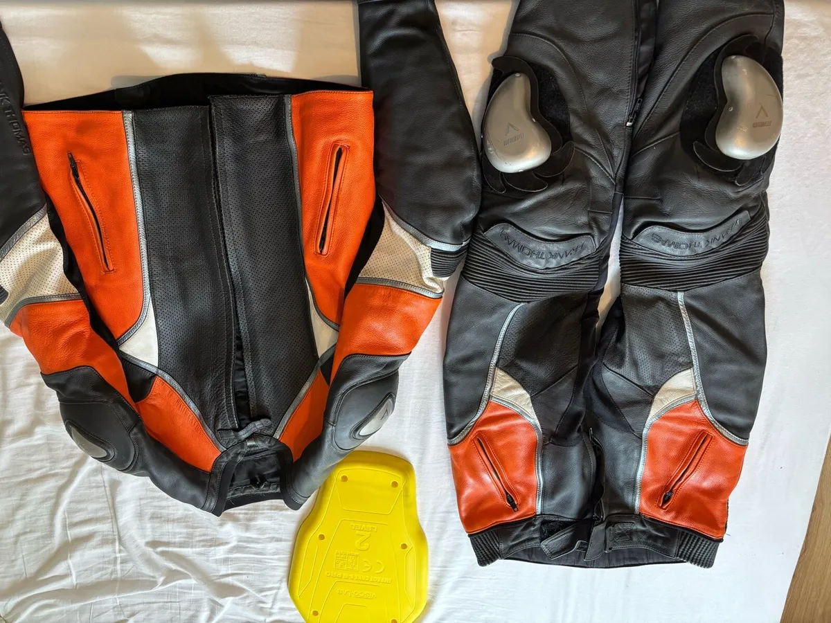 Leather suit, 2 pieces, helmet, leather boots. - Image 1