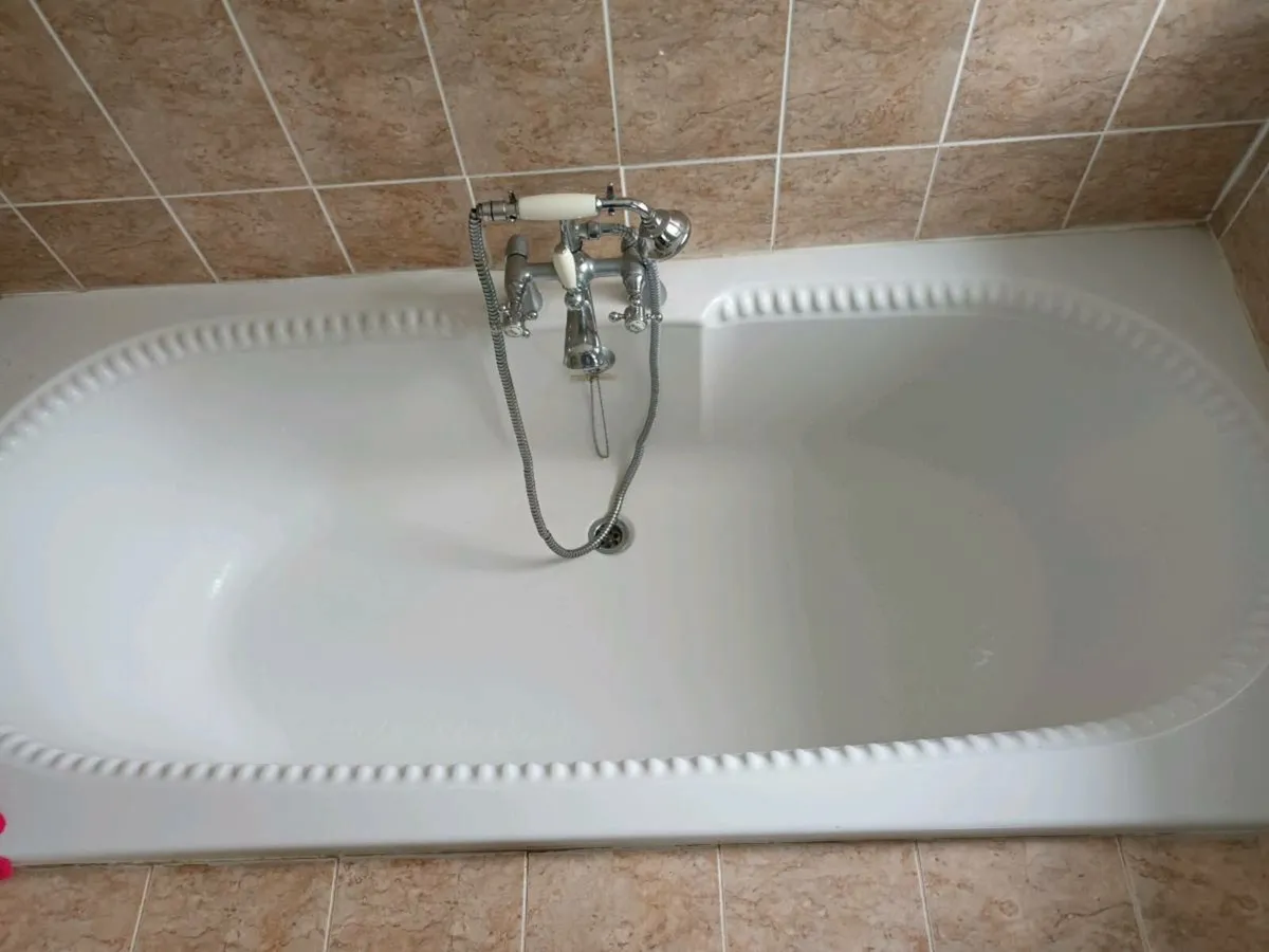 Large bath and taps - Image 1