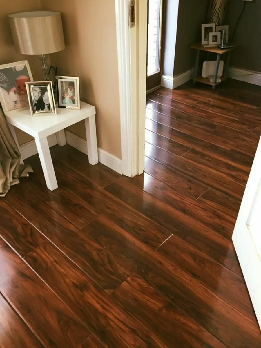 12mm piano finish Laminated Click Flooring - Natio - Image 1