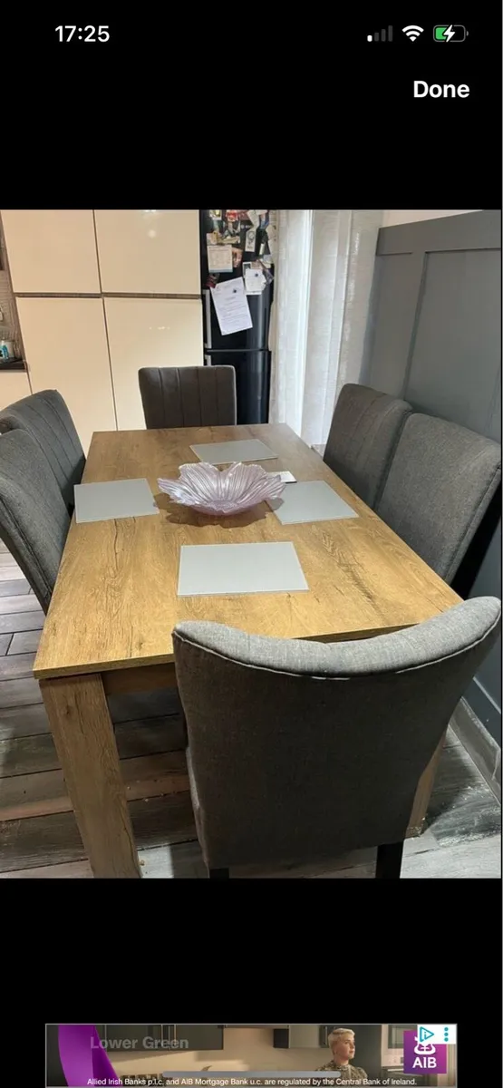 Table and 6 grey chairs   very good condition