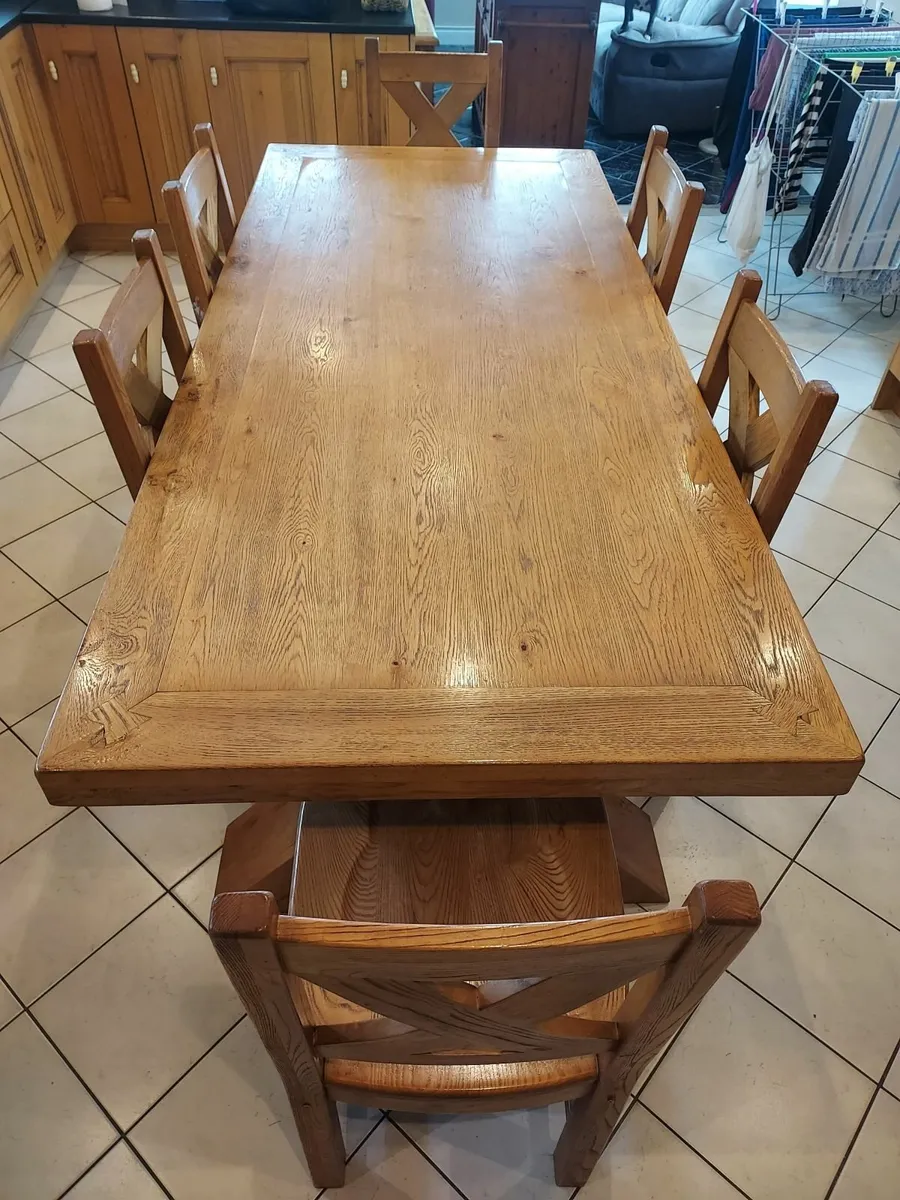 Wooden dining table and 6 chairs - Image 1