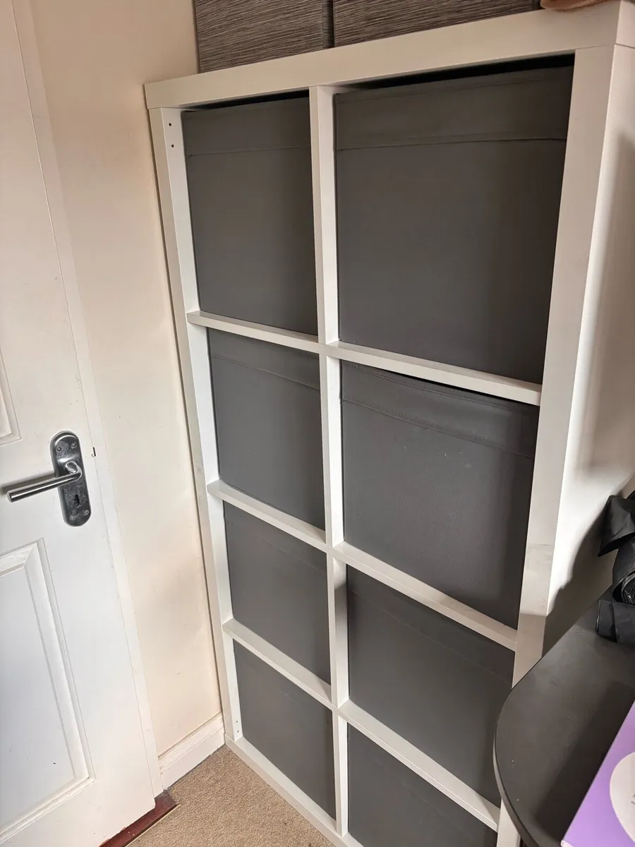 Ikea Kallax unit with boxes