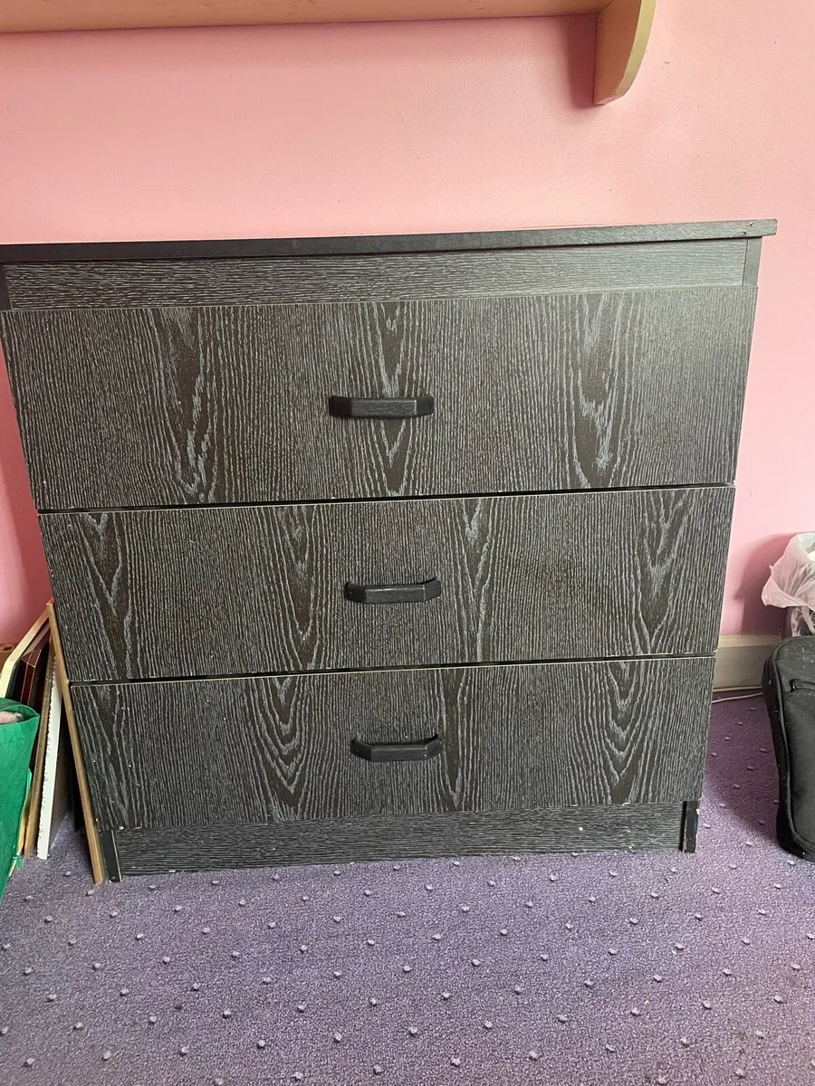 Chest of  solid black drawers