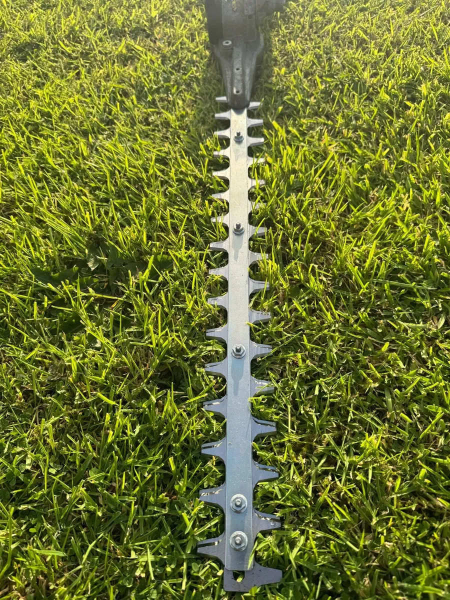 Sthil KM 131R with hedge cutter attachment - Image 1