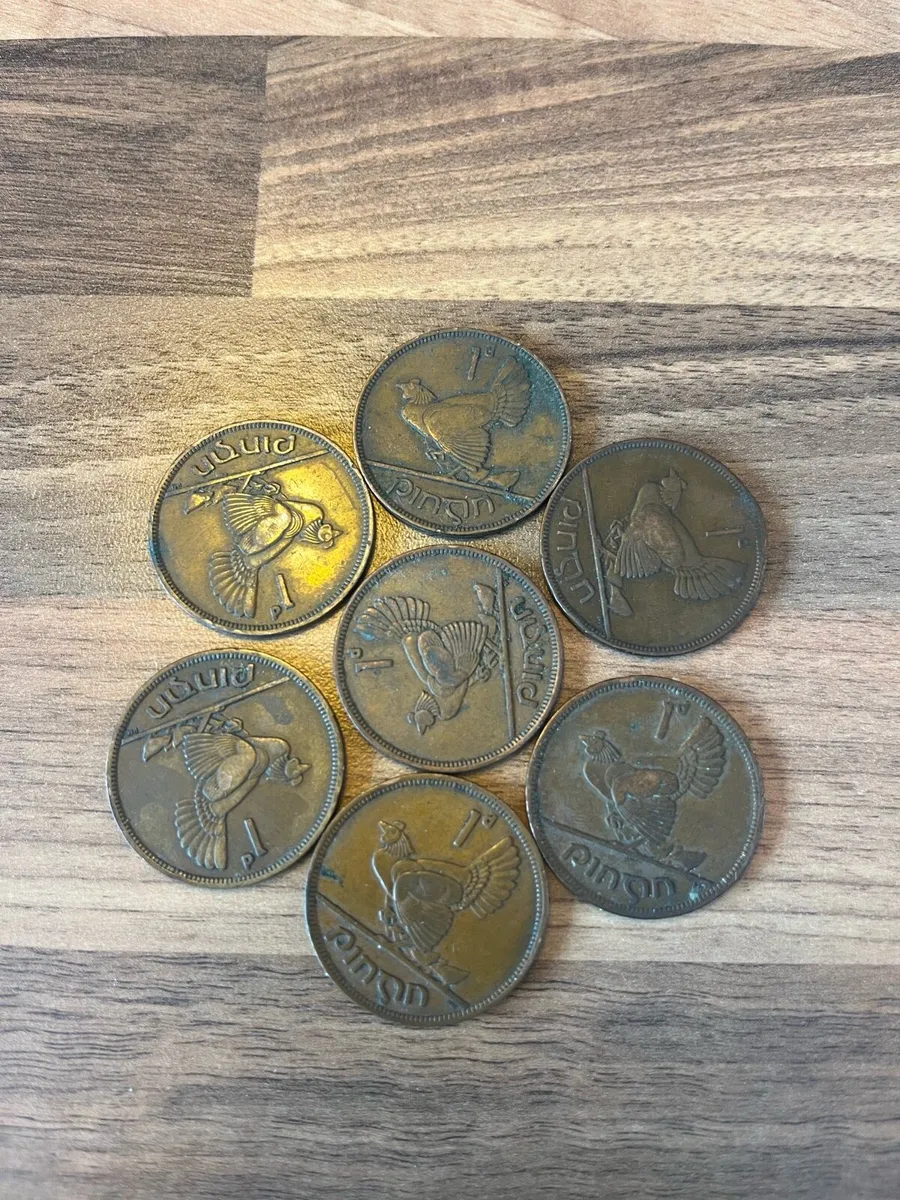 Seven 1930-1940s Irish Punt 1 Pennies - Image 1
