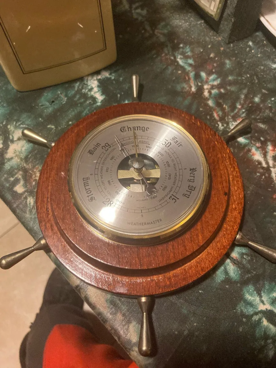 Barometer shaped like ships captain wheel