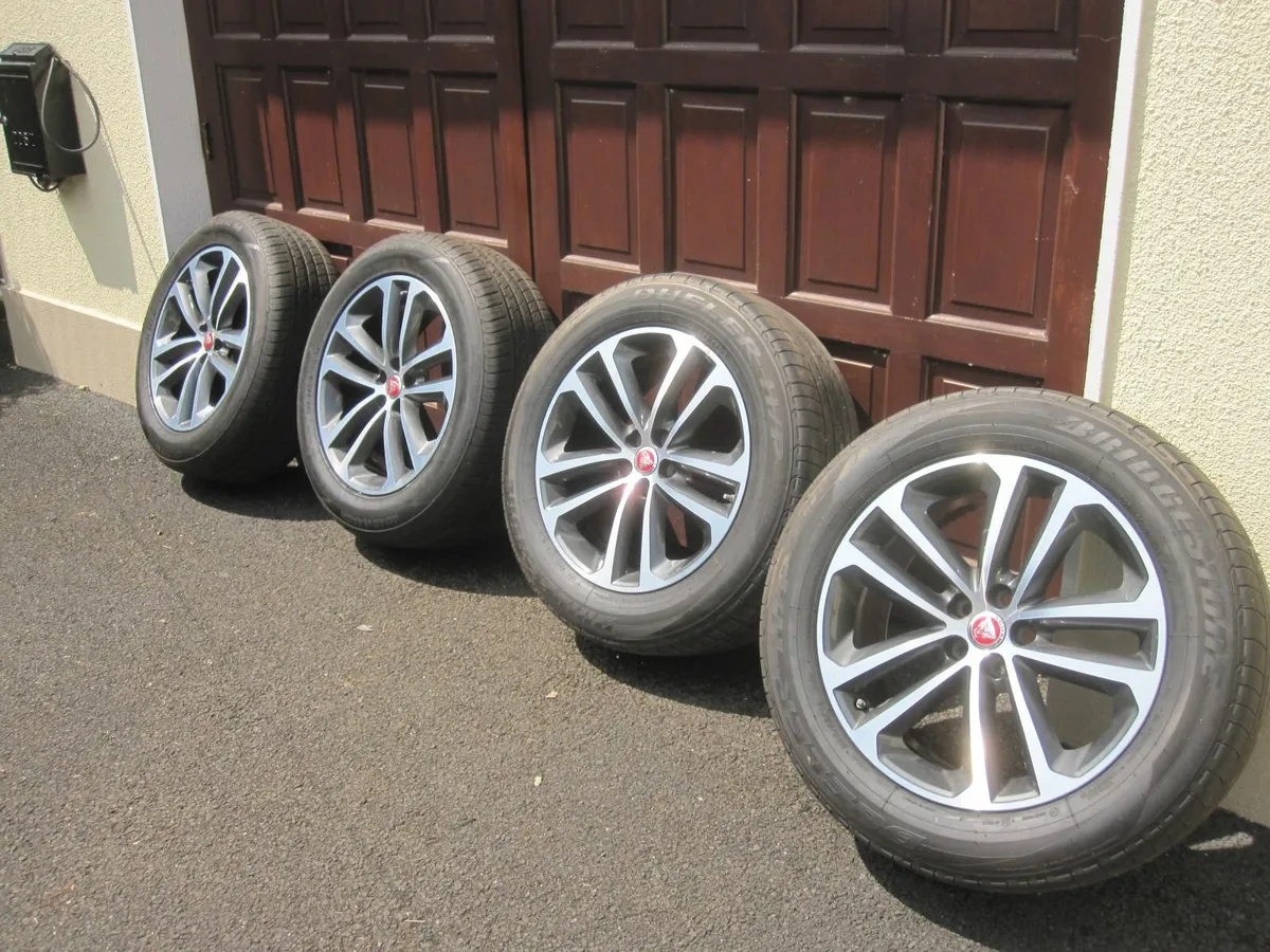 F pace alloys with tyres - Image 1