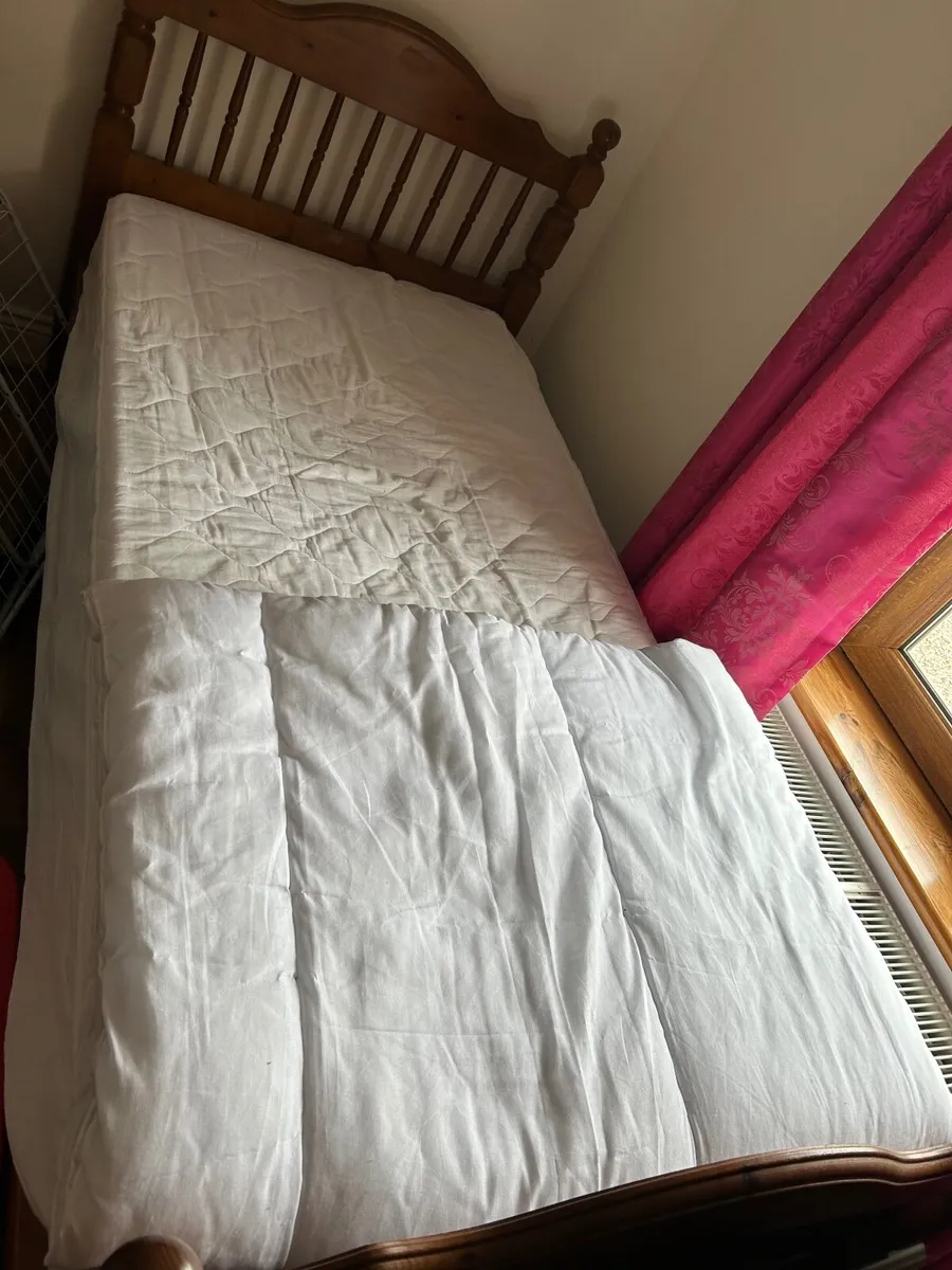 2 x solid wood single beds