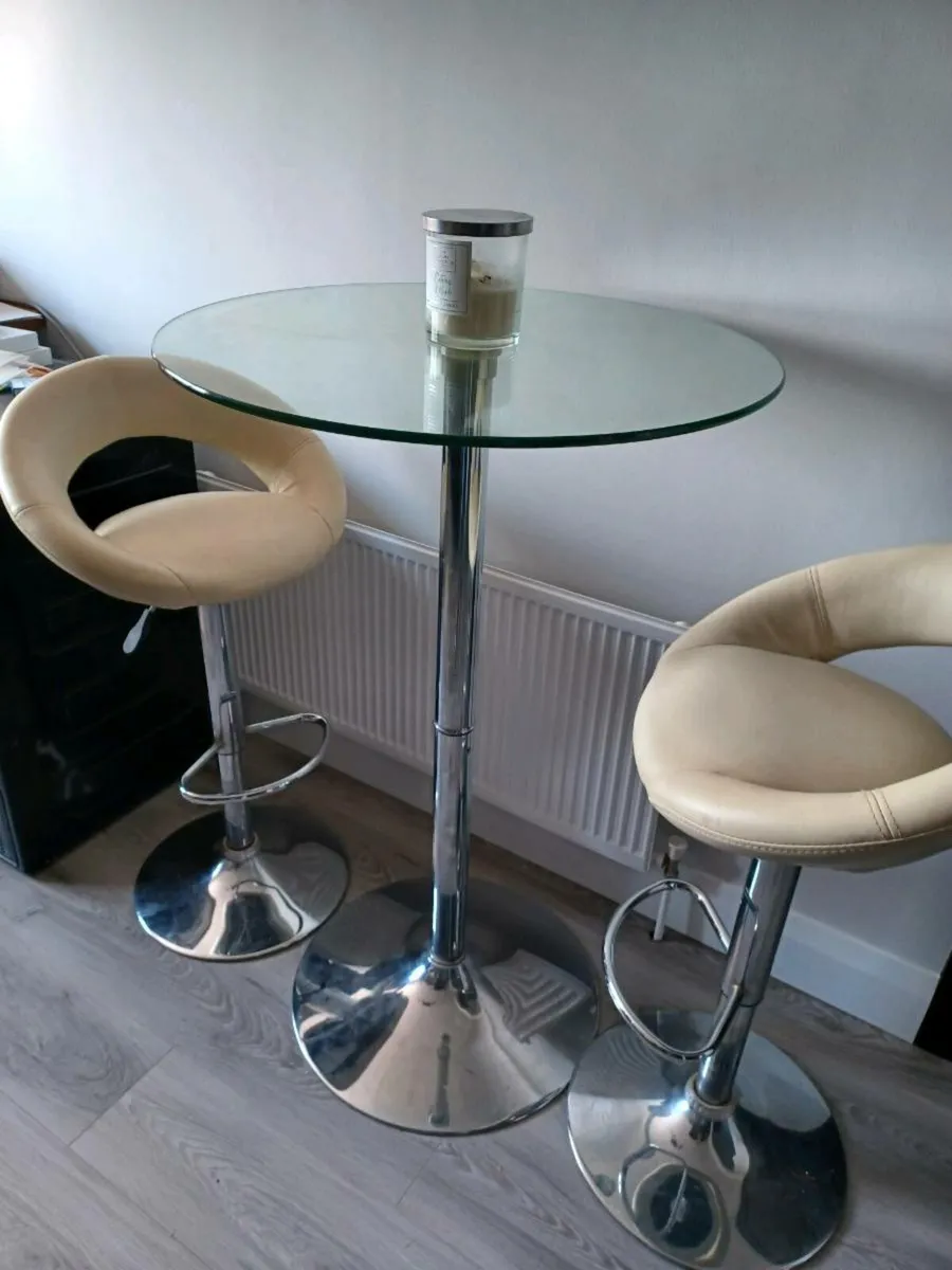Tall Glass Table and 2 Cream Bar Stools - Image 1