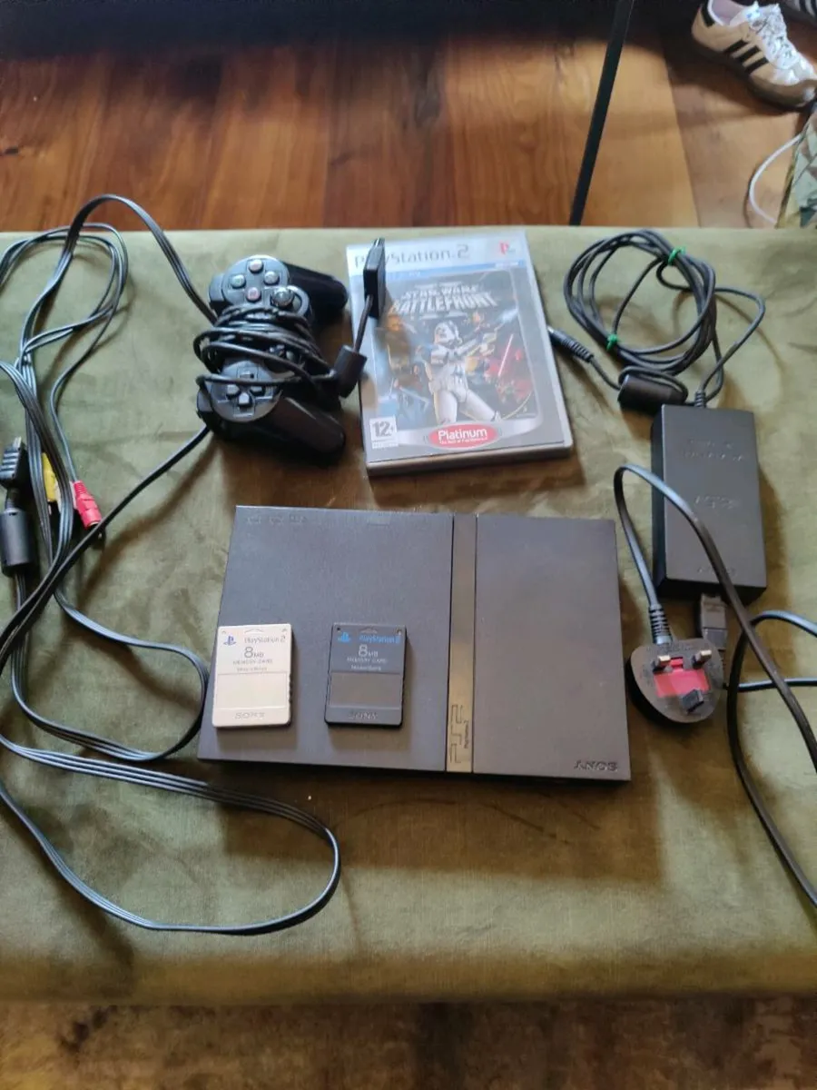PlayStation 2 slim with memory cards and games - Image 1