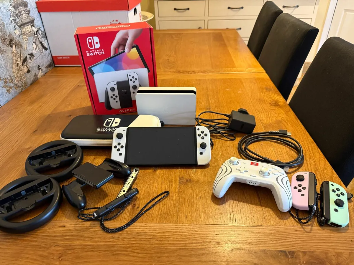 Nintendo OLED Switch with accessories - Image 1