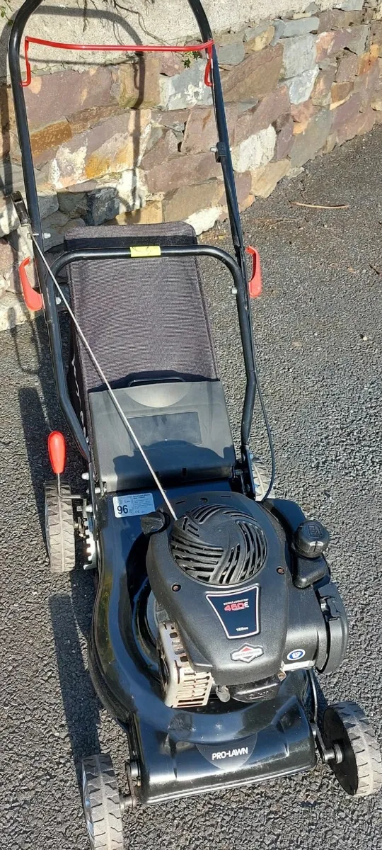 Petrol lawnmower for sale.