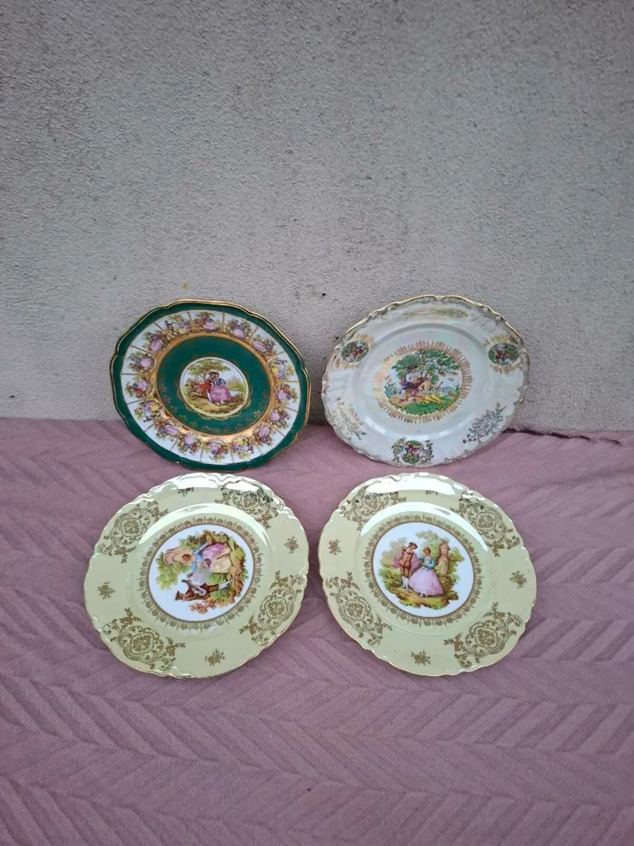 4 china decorated plates