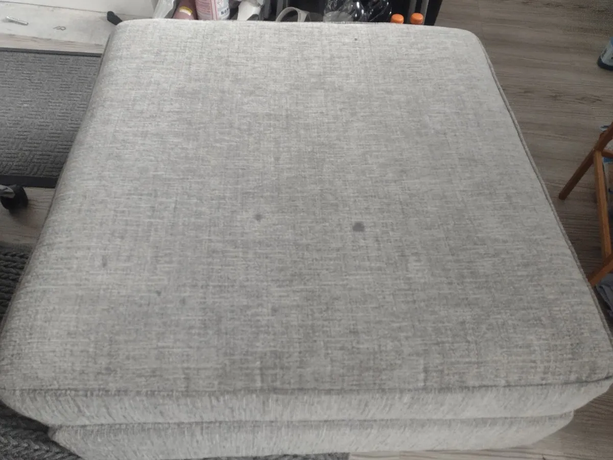 Large grey textured padded pouffe stool - Image 1