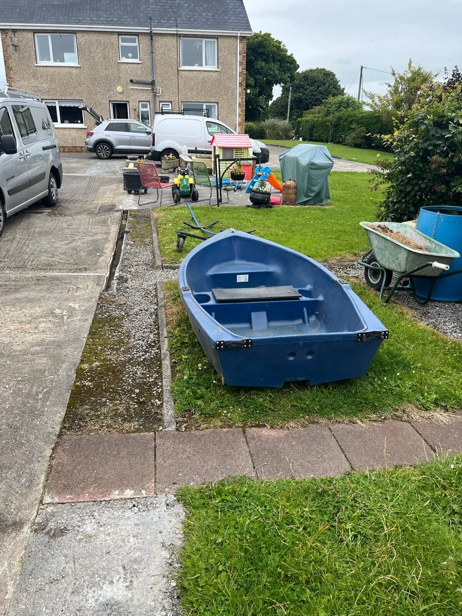 8 foot plastic boat with motor and trolley - Image 4