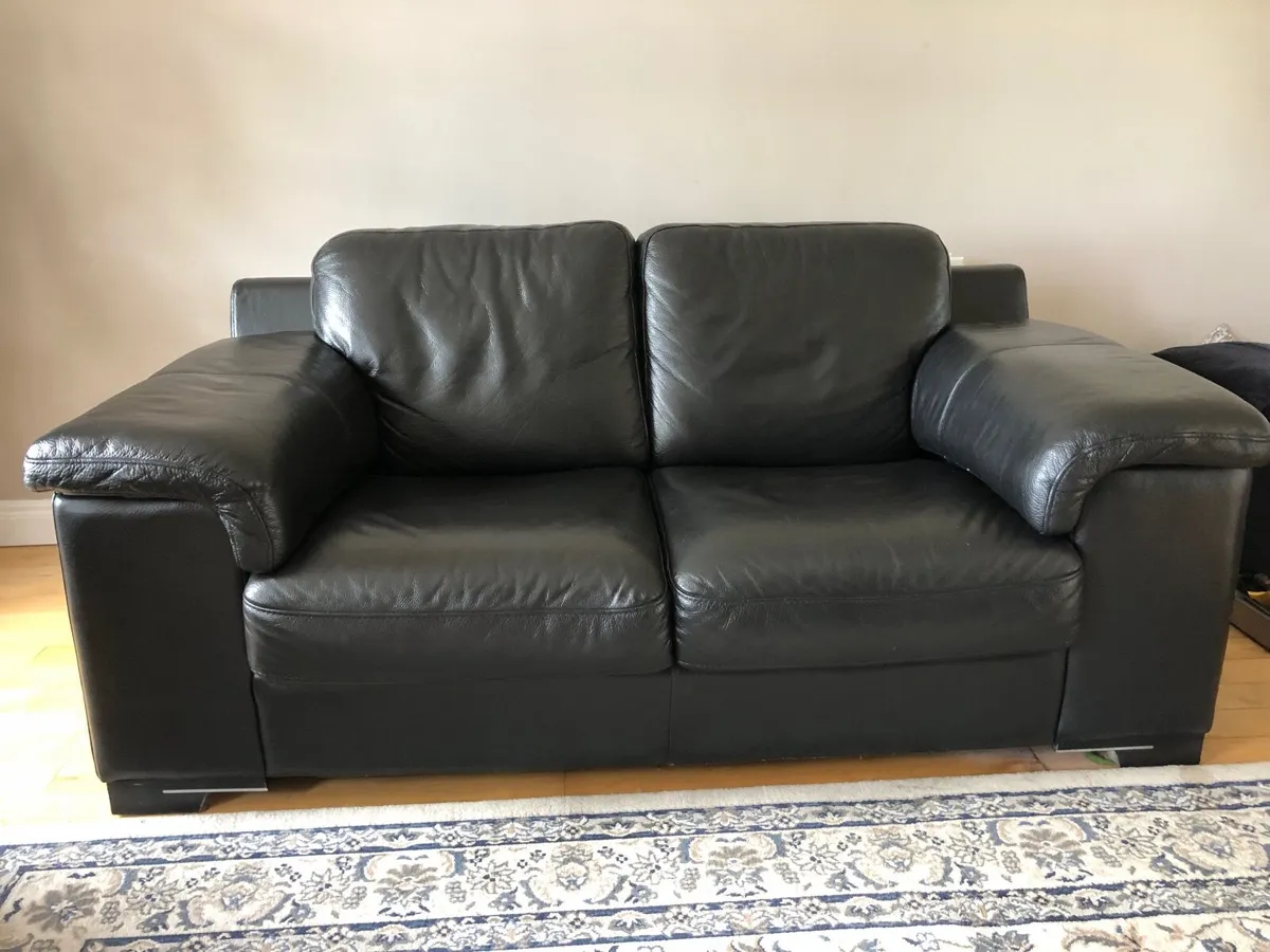 Leather sofas and ikea armchair with footstool - Image 4