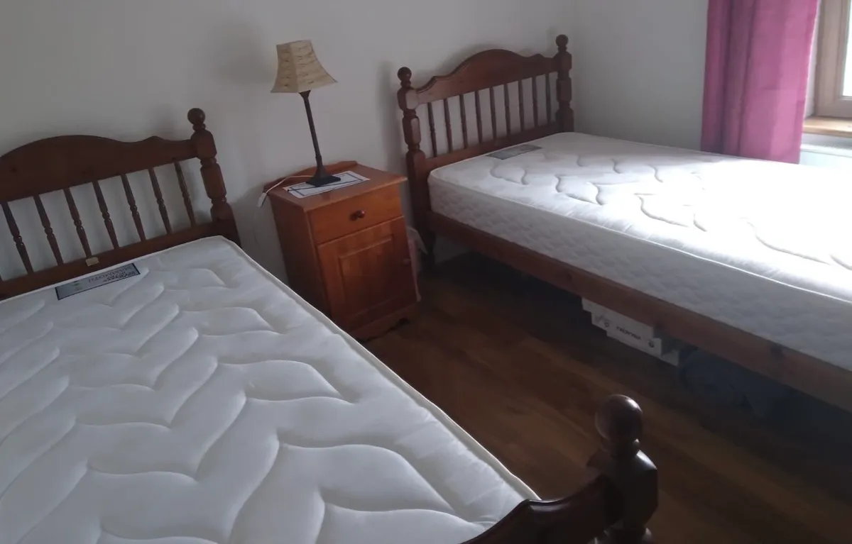 Lovely Matching Pair Of Single Wooden Bed Frames - Image 1