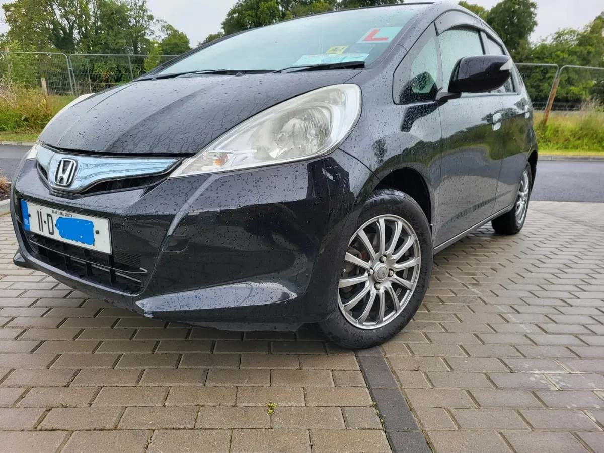 2011 Honda Fit Hybrid - low miles 65k - Image 1